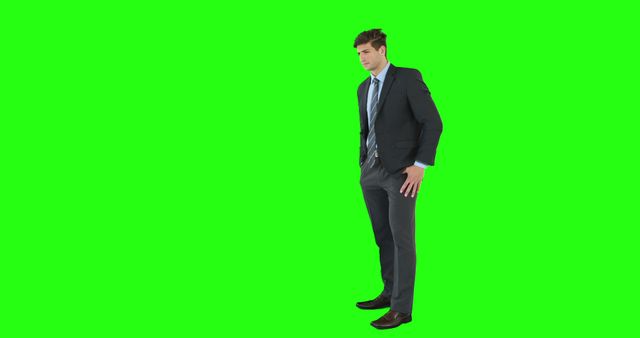 Businessman Posing Confidently In Suit Green Screen Background - Download Free Stock Images Pikwizard.com