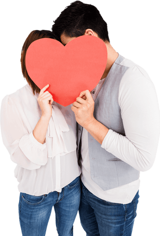 young couple holding heart cutout on transparent background - Download Free Stock Videos Pikwizard.com
