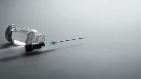 Close-up of Syringe and Vial on Clean Background for Medical Use
