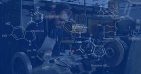 Machinist at metal lathe surrounded by chemical formulas