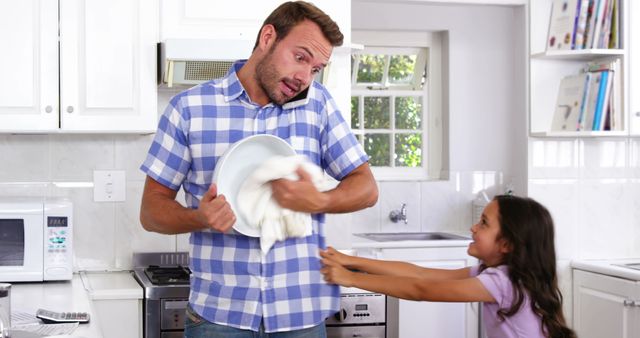 Multi-tasking Father Washing Dishes While on Phone Call - Download Free Stock Images Pikwizard.com