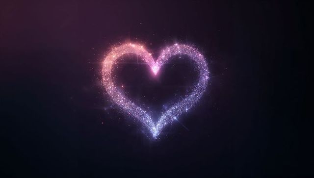 Glowing particle heart emitting multicolor neon sparkle on dark purple-black gradient background