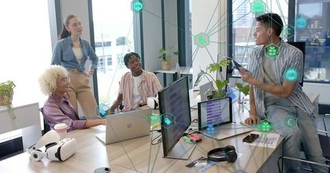 Creative team collaborating with augmented reality overlays at modern coworking workspace