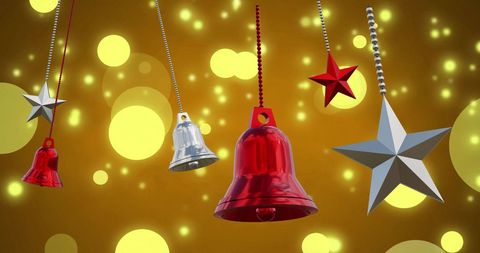 Festive Christmas Bells and Stars Over Golden Bokeh Background - Download Free Stock Images Pikwizard.com