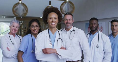 Diverse Medical Team United in Hospital Corridor Confidently