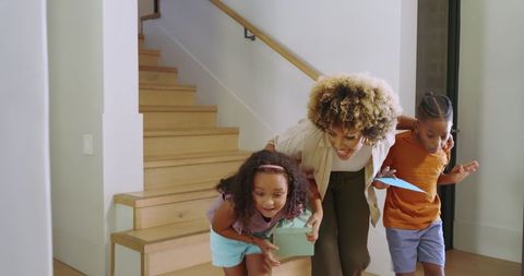 Cheerful Family Celebrating Together in Bright Home