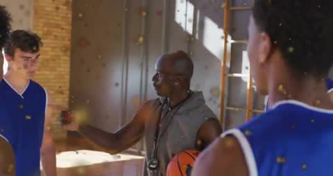 Basketball Coach Inspires Team with Animated Pep Talk in Gym