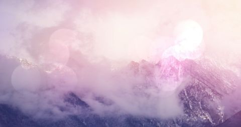 Misty Winter Mountains with Dreamy Lens Flares