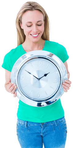 smiling woman in green holding transparent wall clock - Download Free Stock Videos Pikwizard.com