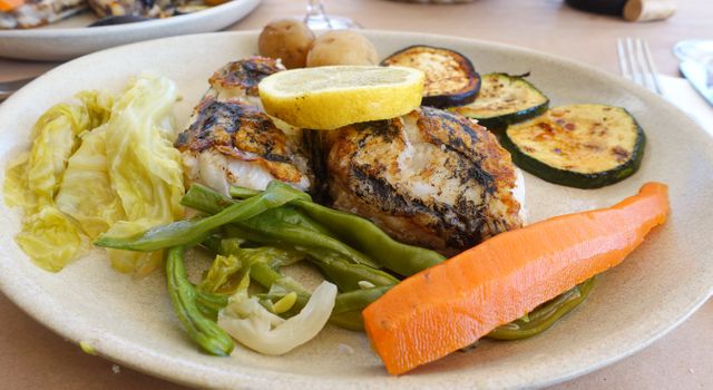 Grilled Fish Fillet Plate with Vegetables and Lemon - Download Free Stock Photos Pikwizard.com