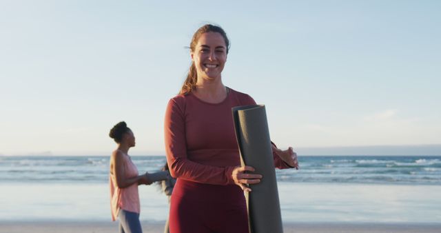 Smiling Woman Ready for Beach Yoga with Friends at Sunset - Download Free Stock Images Pikwizard.com