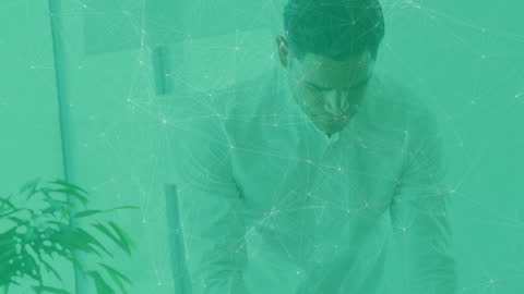 Caucasian Businessman in Office with Digital Connection Overlay