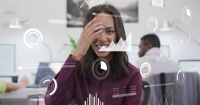 Businesswoman Interacting with Augmented Reality Data in Modern Office - Download Free Stock Images Pikwizard.com