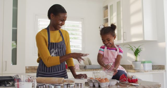 Mother and Daughter Baking Together in a Bright Modern Kitchen - Download Free Stock Images Pikwizard.com