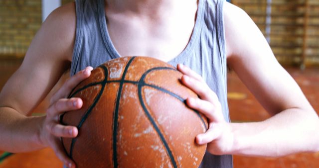 Young Player Holding Basketball Ready to Shoot Indoors - Download Free Stock Images Pikwizard.com