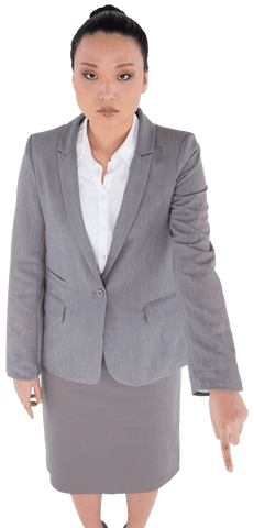 Businesswoman in suit pointing down on transparent background