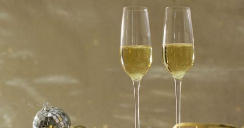 Champagne Glasses and Festive Decorations for New Year's Eve Celebration - Download Free Stock Images Pikwizard.com