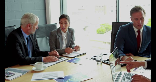 Business Team Collaborating During a Meeting - Download Free Stock Images Pikwizard.com