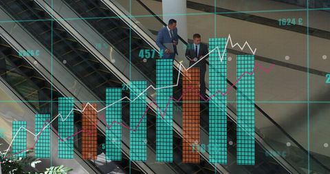 Business Professionals Analyzing Data Over Digital Graphs