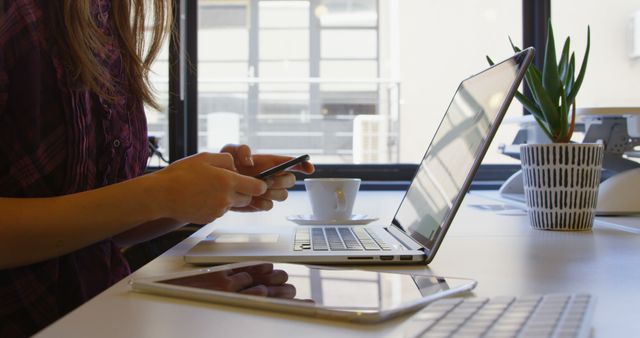 Busy Businesswoman Using Mobile Phone in Modern Office - Download Free Stock Images Pikwizard.com