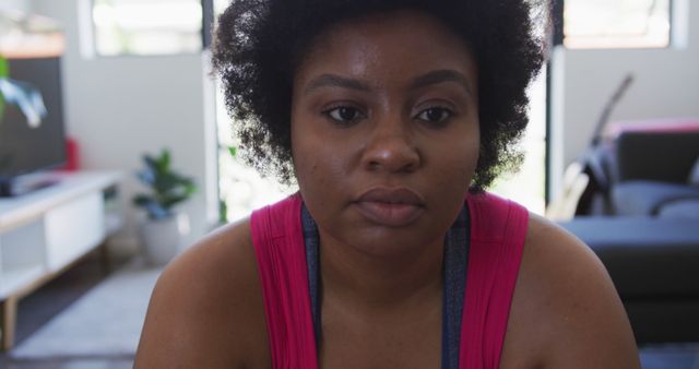 Close-up on Thoughtful African American Woman in Living Room - Download Free Stock Images Pikwizard.com