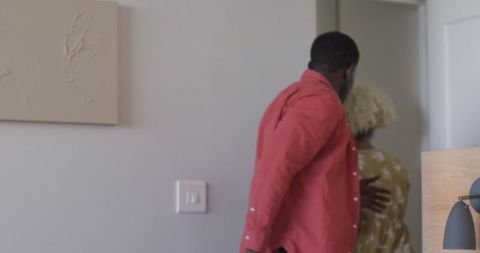 Friends Laughing and Dancing Energetically Indoors