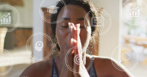 Mindful Woman Meditating at Home with Augmented Reality Wellness HUD and Focus Icons
