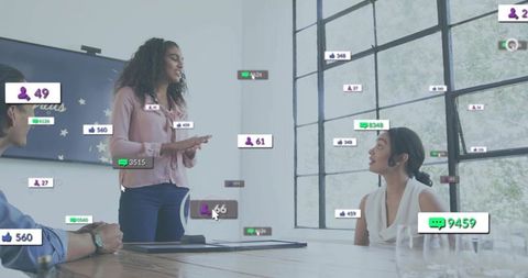 Professional presenting to team with engagement overlays in modern boardroom