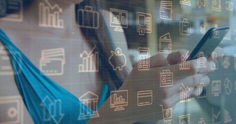 Businesswoman engaging with financial technology on smartphone