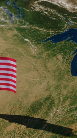 Fluttering American flag casting shadow over central US plains | Vertical aerial video
