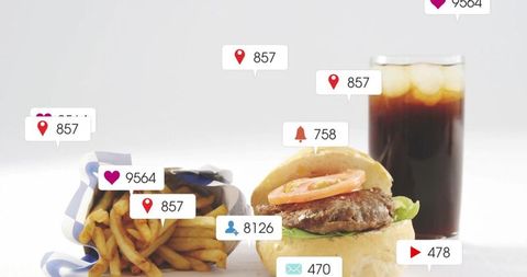 Fast Food Concept: Cheeseburger, Fries, Cola with Social Media Symbols