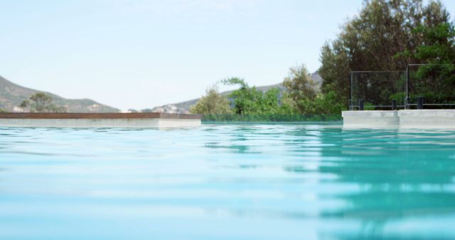 Refreshing Outdoor Pool with Scenic Mountain View - Download Free Stock Images Pikwizard.com
