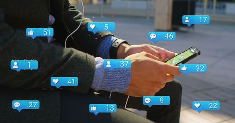 Person Accessing Social Media on Smartphone with Interactive Icons - Download Free Stock Images Pikwizard.com
