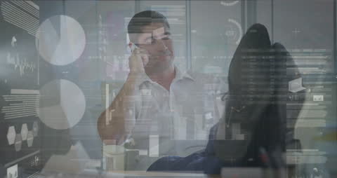 Businessman Analyzing Financial Data Overlaid