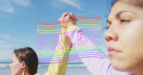 Pride Celebration Couple Holding Hands on Beach