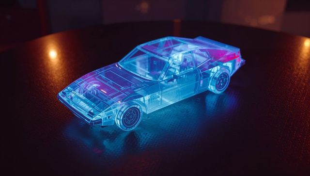 Holographic glass sports car casting neon blue and magenta reflections on tabletop