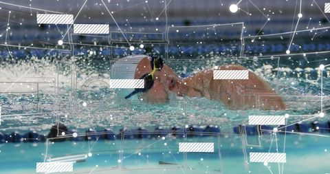 Competitive swimmer performing freestyle with digital data overlay in indoor pool