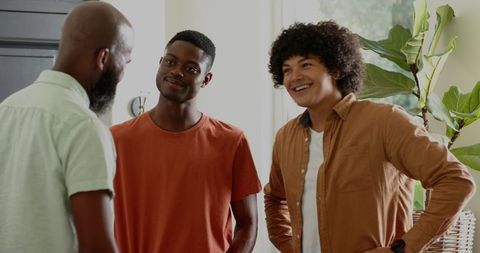 Three Friends Chatting Happily in Cozy Home Environment