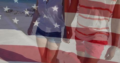 Couple Strolling on Beach with US Flag Overlay