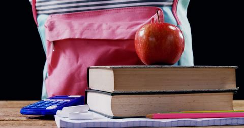 Backpack with School Supplies and Apple for Education Preparation - Download Free Stock Images Pikwizard.com