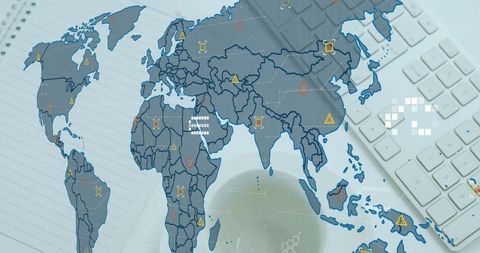 Global data network overlay on modern workspace with keyboard, coffee cup and analytics