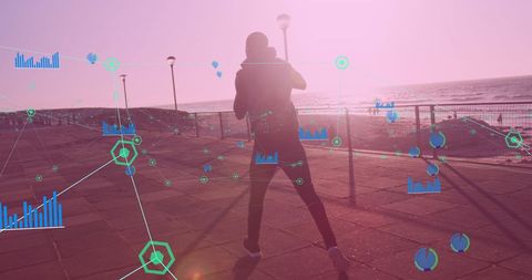 Boxer Exercising with Digital Fitness Analytics by Seaside