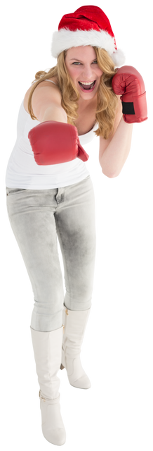 Cheerful Woman in Santa Hat and Boxing Gloves on Transparent Background - Download Free Stock Videos Pikwizard.com