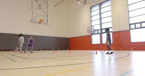 Coaching basketball drill incorporating movement and skill