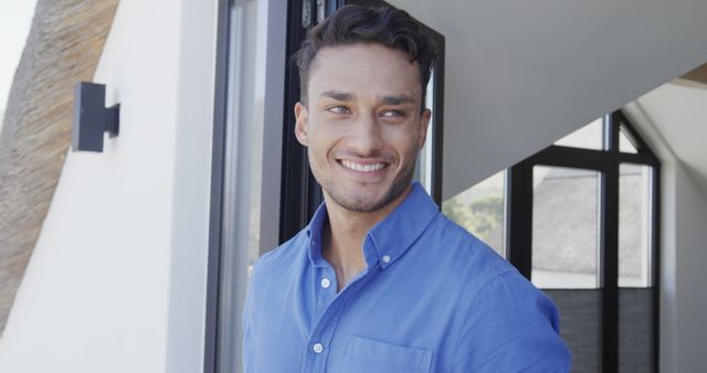 Confident Man Smiling in Modern Home - Download Free Stock Images Pikwizard.com