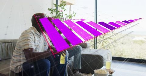 Men watching augmented reality 3d purple bar chart overlay while relaxing on couch