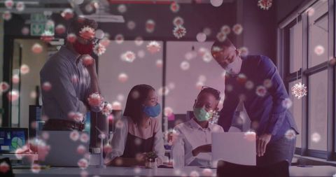 Office Team Collaborating Safely with Face Masks During Pandemic