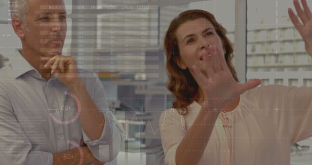 Business Professionals Analyzing Data Visualization on Transparent Screen - Download Free Stock Images Pikwizard.com