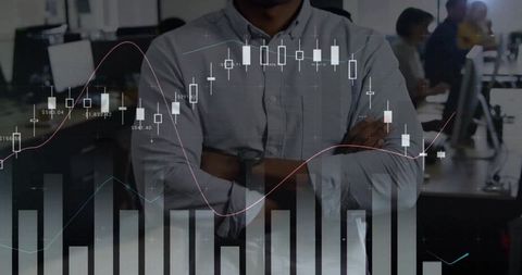 Business leader studying candlestick charts with arms crossed in modern office