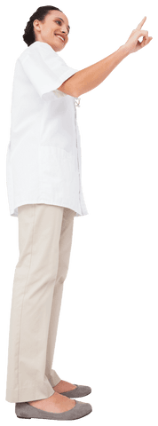 confident female doctor pointing up on transparent background - Download Free Stock Videos Pikwizard.com